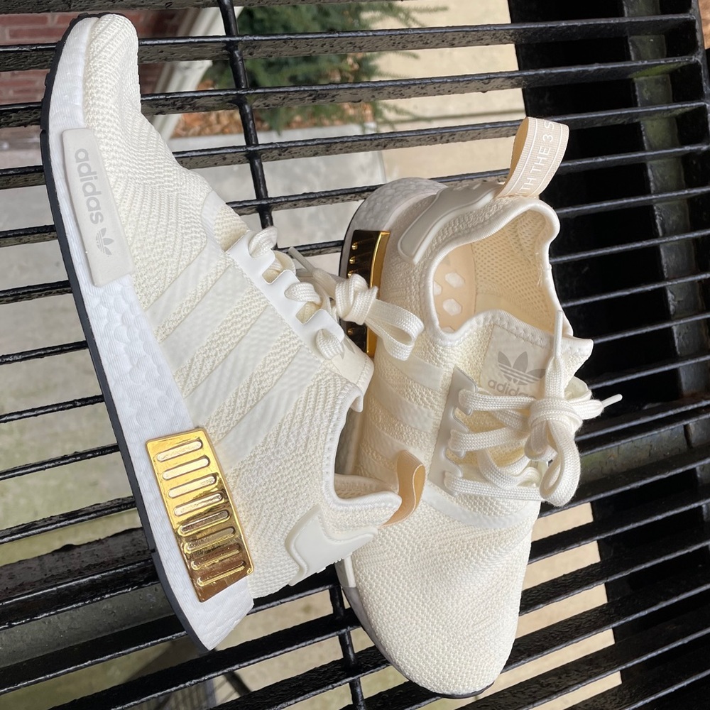 Adidas white ultra boost with gold detailing